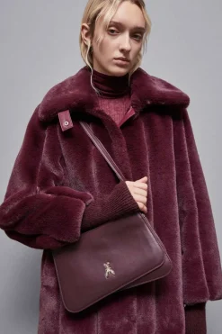 Borsa a tracolla con manici in pelle