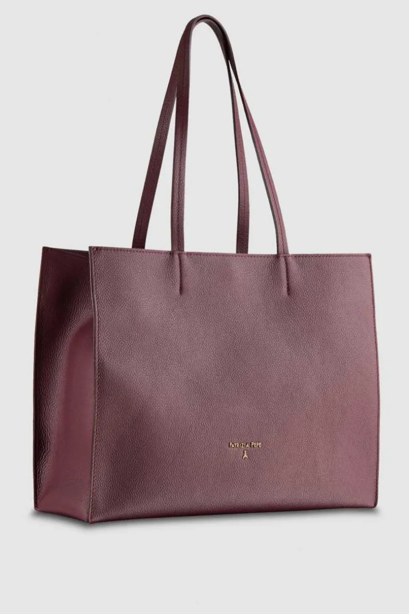 Borsa shopping in pelle martellata