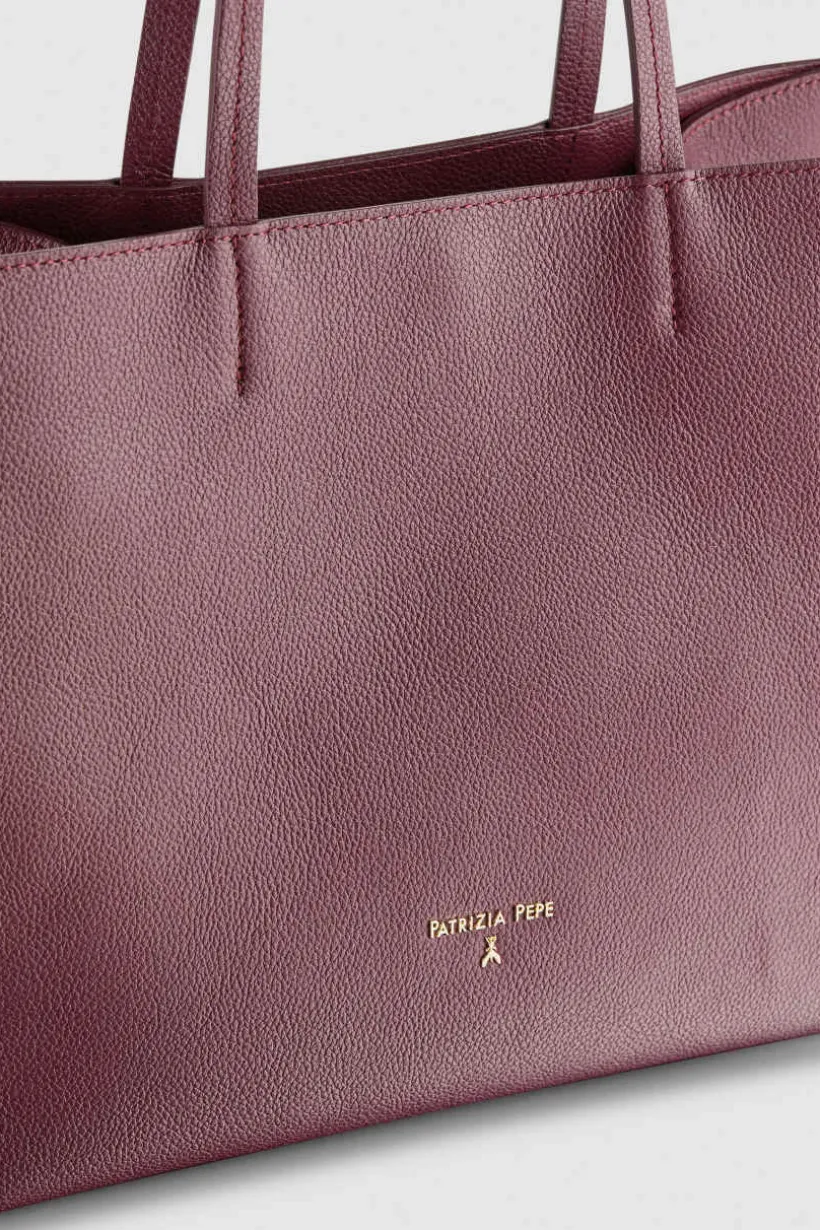 Borsa shopping in pelle martellata