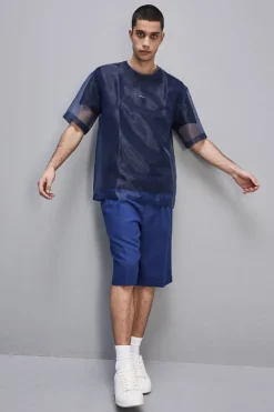 Boxy T-shirt manica corta con bordo taglio vivo