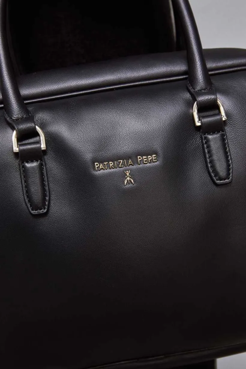 Camera case a tracolla con zip in pelle