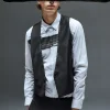 Gilet asimmetrico con piercing