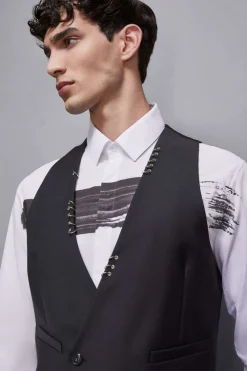 Gilet asimmetrico con piercing