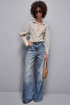Jeans a vita bassa e gamba larga