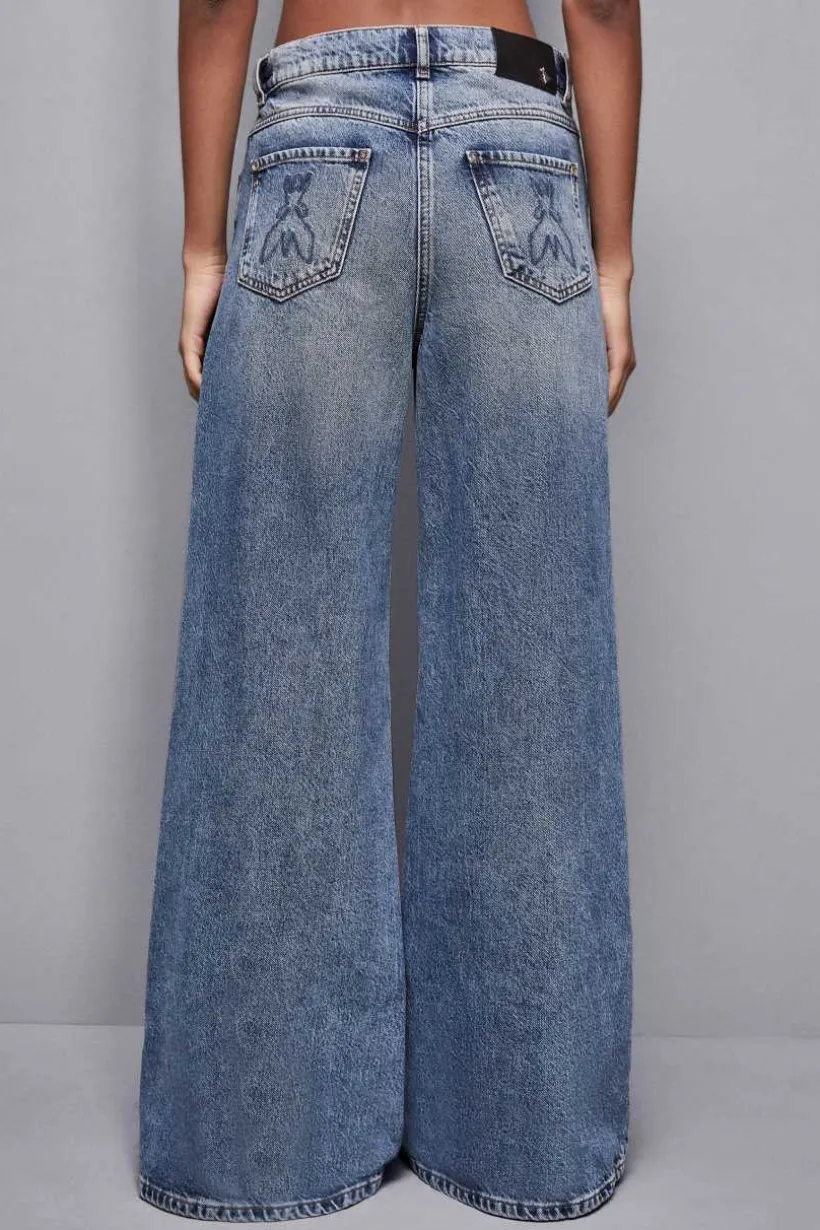 Jeans a vita bassa e gamba larga