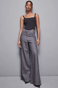 Jeans grigio vita bassa wide leg con strass