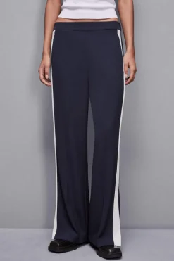 Pantalone vita bassa con banda colorata