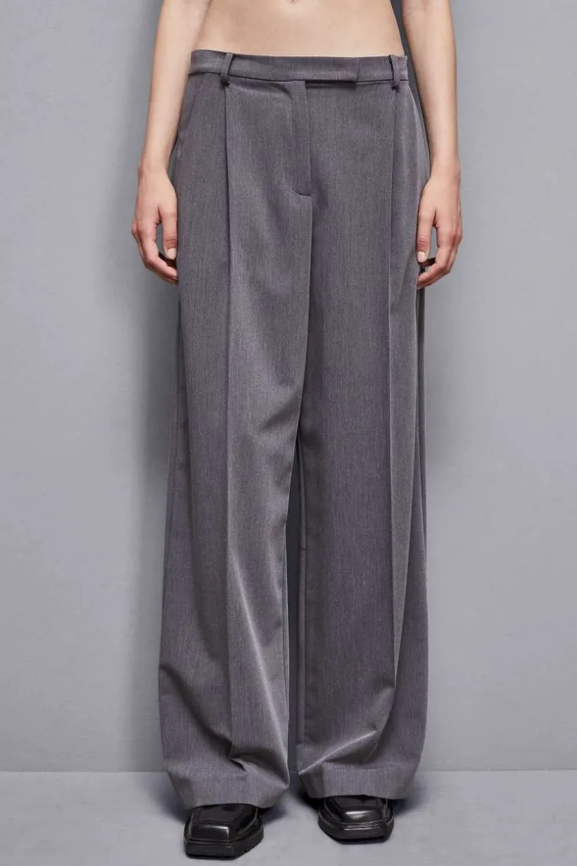 Pantaloni con pieghe in viscosa Essential