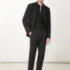 Pantaloni slim in tela