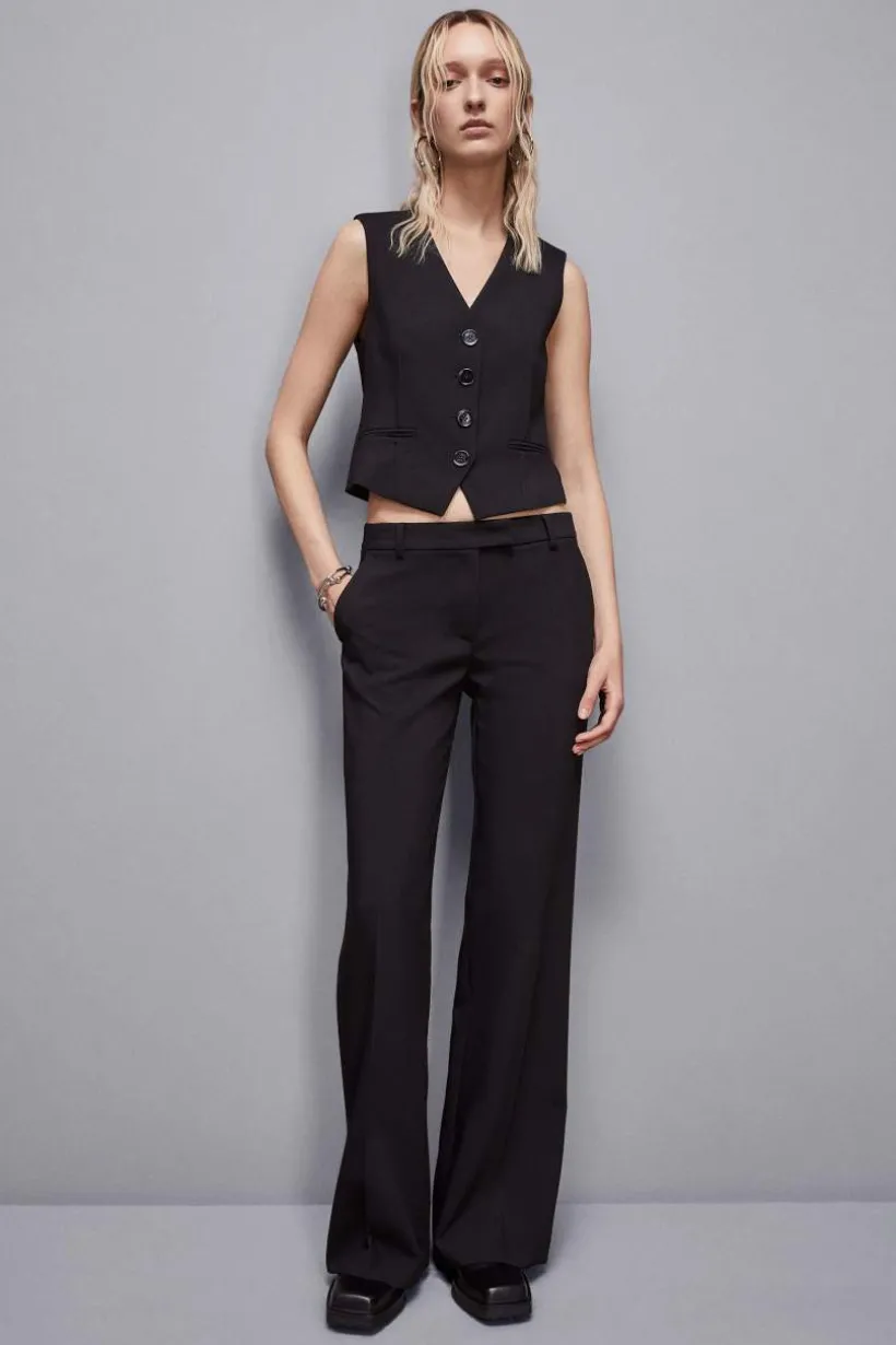 Pantaloni vita bassa in twill