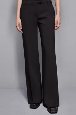 Pantaloni vita bassa in twill