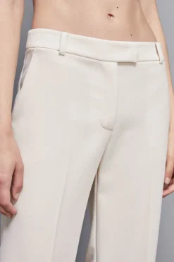 Pantaloni vita bassa in twill