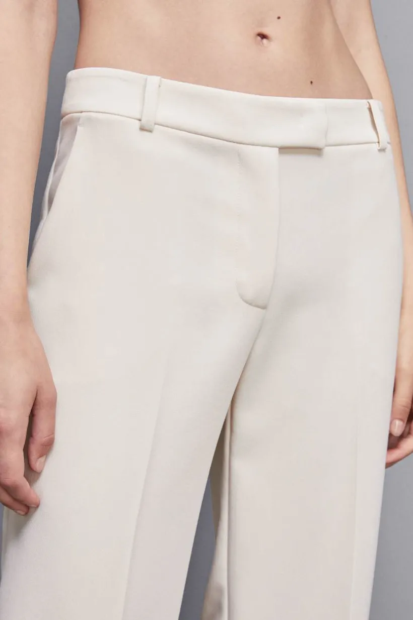 Pantaloni vita bassa in twill