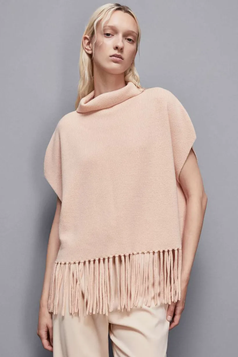 Poncho con frange in lana organica