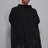 Poncho con frange in lana organica