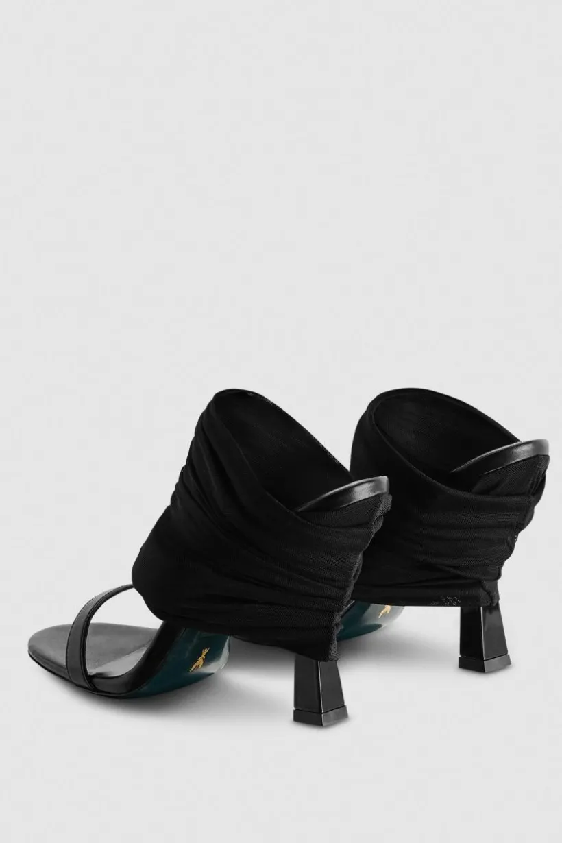 Sandali con tacco in pelle